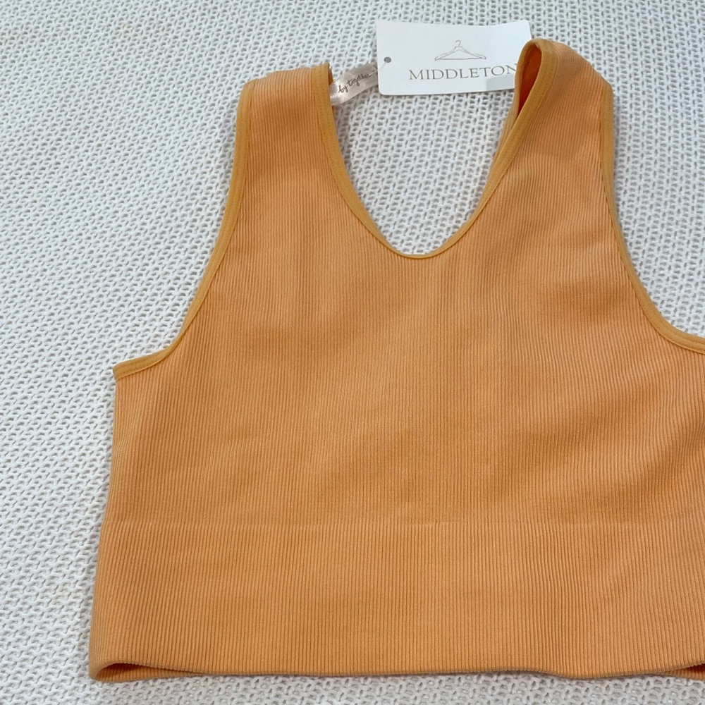 By Together take the plunge tank color is “ coral cloud“ Size S/M